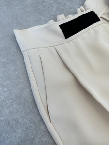 HIGH-WAISTED FRONT WRAP PANTS